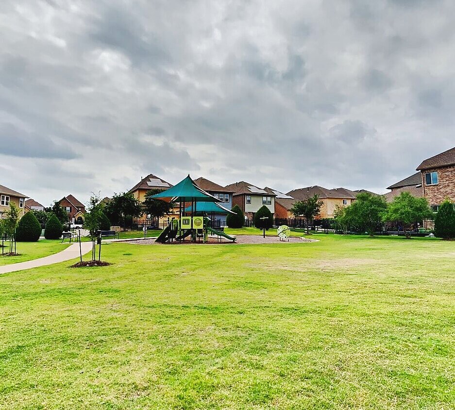 The park and playground directly behind the home
